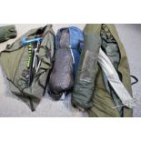 A fishing bivvy / tent, and a large quantity of bag sticks and rod rests.