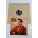 Elvis Presley 7" single I Need You So and 78 record One Night.