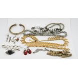 A group of costume jewellery including Charles Rennie Mackintosh style items.