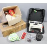 Photographic equipment to include a darkroom kit, LPL Enlarger (boxed) and a typewriter in case.