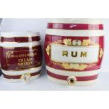 A Williams & Humbert Cream Sherry barrel and Victorian Rum example, 39cm high.