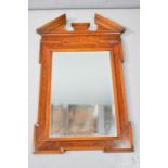 A burr wood tabernacle mirror, with a beaded edge by William Maclean, 102 by 64cm.