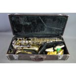 A Yamaha YAS-23 Saxophone, in the original hard case.