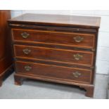 A late 19th century chest of drawers, mahogany with inlaid banding to the drawers.