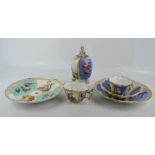 Two Meissen plates, with blue crossed swords to the bases, a French porcelain egg with cover,