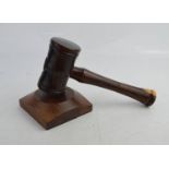 A hand turned lignum vitae gavel and block.