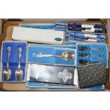A group of silver plated flatware, with five boxed examples with silver handles, boxed.