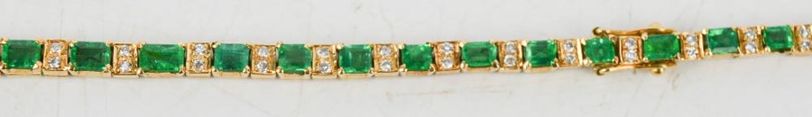 An 18ct emerald and diamond line style bracelet with trap cut emeralds, each with two diamonds - Image 2 of 2
