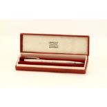 A Gerrard & Co Ltd silver pencil in a presentation box.