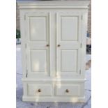 A pine painted double wardrobe with two drawers. 183cm height x 112cm wide x 61cm depth