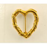 A 9ct gold plated brooch in the form of a heart.