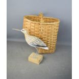 A wine basket and a treen model bird.