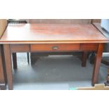 An antique mahogany desk with single drawer to the front, 78cm high, 134cm wide by 68cm deep.