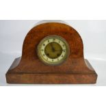 A 1930s burrwood mantle clock, with arabic dial, 26 by 38cm.