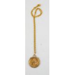 A George V full sovereign, 1917, in 9ct gold mount with a gold coloured chain necklace. (