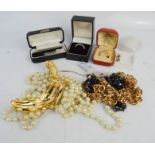 A group of various jewellery including ring, earrings, simulated pearl necklace, gold coloured
