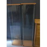 A group of Ikea glass display cabinets.