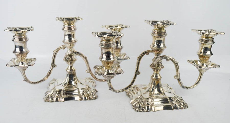 A pair of silver candelabra by William Hutton & Sons Ltd, Sheffield 1960, with removable candle