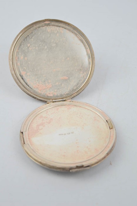 A silver compact, with machine engraved decoration and initials P.M., Birmingham 1920. - Image 2 of 2