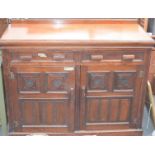An Edwardian mahogany sideboard, with two drawers above two cupboard doors, 94cm high, 118cm wide,