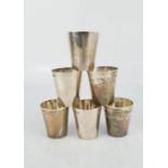 A set of six silver toasting cups, Birmingham 1927, 2.87toz.