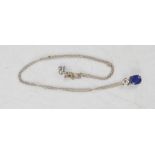 An 18ct white gold, diamond and sapphire pendant necklace, approximately 0.7ct diamond, 4.4g total.