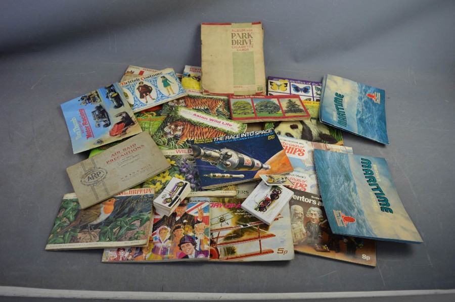 A quantity of vintage cigarette card albums including Wild Birds in Britain.