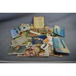 A quantity of vintage cigarette card albums including Wild Birds in Britain.