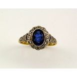 An 18ct gold and sapphire ring, oval set, size J, 2.7g.