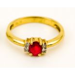 A 9ct yellow gold, ruby and diamond ring, size J/K, ruby approximately 2g.