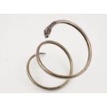 A silver (unmarked) snake form bangle, wrap around form, detailed head, 0.68toz.