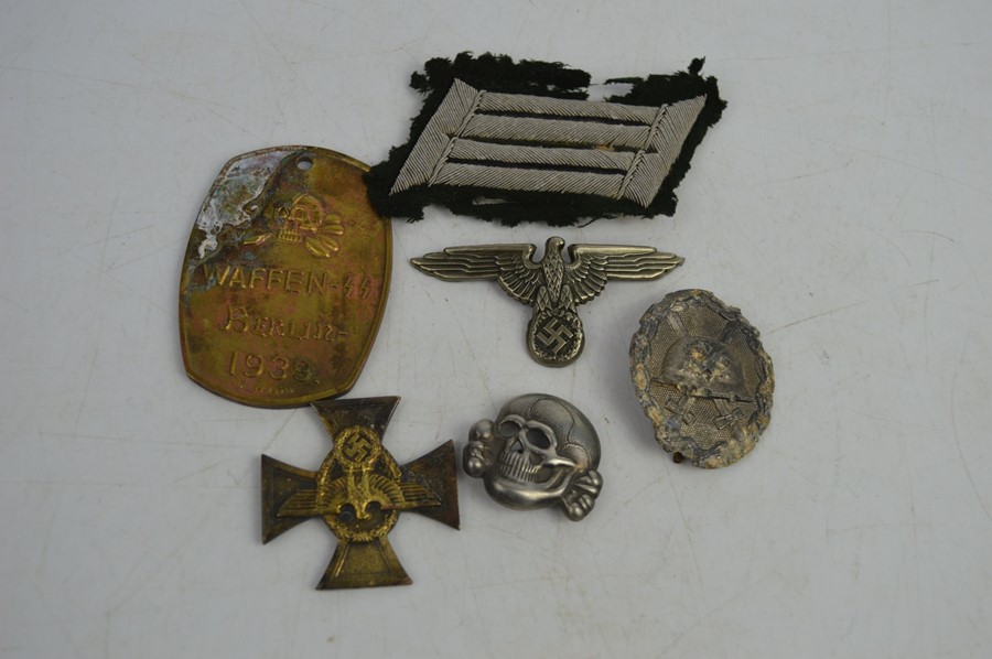 A group of SS police badges