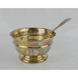 A silver bowl and spoon, Sheffield 1934, 5.58toz.