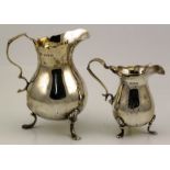 Two silver jugs; one Chester 190, one Birmingham 1927.