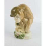 A porcelain monkey, no 8334, 19 to the base.