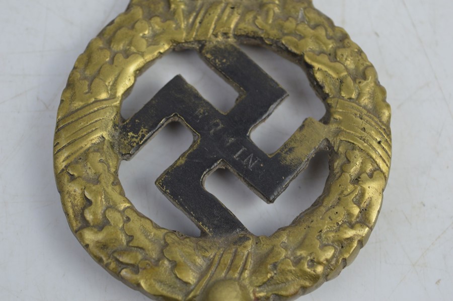 A German Nazi brass emblem possibly a flag pole top marked Erwin 1928 - Image 2 of 3