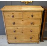 A painted pine Victorian chest of drawers, with two over three long drawers.