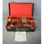 A Westminster by Besson, Flugelhorn no 448902, with hard case and various mouthpieces.