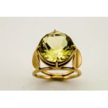 A 9ct gold and citrine ring, with large brilliant cut citrine, size N.
