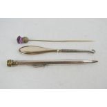 A silver propelling pencil, a silver hat pin with amethyst thistle surmount and a silver handled