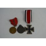 A 1941 Romanian crusade against communism medal together with a Iron cross 2nd class and a eastern