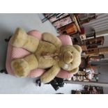 A large teddy bear, 100cm tall.