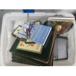 A box of mixed items to include a chinese bowl - Table mats - dvds and books on Birds