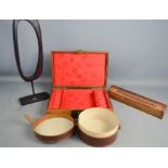 A wooden jewellery box, an incense box, leather case and contemporary oval sculpture.