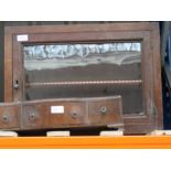 A 1930's glass fronted pantry cupboard with some drawers