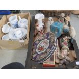 Two boxes of mixed items to include - Chinese plates - Telephone money box - Budgie ornaments -
