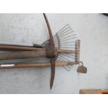 A group of tools to include rakes