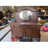 An Edwardian mirrored dressing table, with oval mirror, two drawers, cabriole legs and pad feet, 122