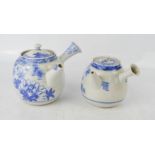 Two blue and white Chinese stoneware glazed teapots.
