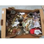 A box of mixed items to include - wooden candle sticks - Brassware - copper plates - ornaments etc